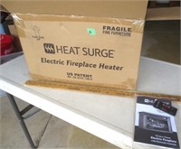 Heat Surge electric fireplace  heater, new