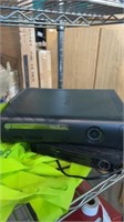 Bag of a DVD player and an Xbox 360 no cords used
