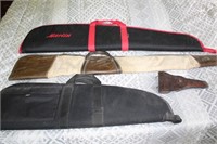 3 LONG GUN SOFT CASES AND 1 LEATHER PISTOL HOLSTER