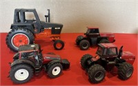 4 Toy Tractors Includes