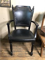 EBONIZED WOOD AND LEATHER CHAIR