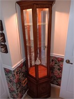 Lighted curio cabinet.