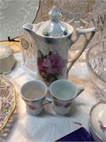 Three piece hand painted tea set