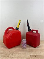 two gas cans -some fuel
