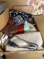 Box of assorted fabric pieces