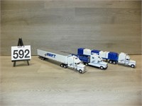 3 1/64 Swift Semi Trucks, 1 is Spec Cast
