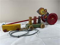 Vintage rolling noise maker and other toys