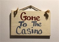 E5) “Gone to casino” sign