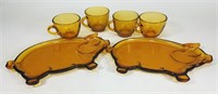 Glass cups and pig platters