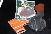 4 LEATHER PISTOL HOLSTERS