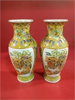 2 matching Japanese vases 8.25 inches tall
