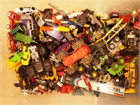 Container of mostly small die-cast and plastic