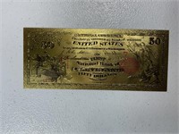 Reproduced note layered in 24k gold