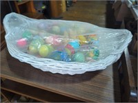 Wicker basket full of Easter eggs