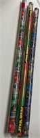 Three rolls of Star Wars Christmas wrapping paper