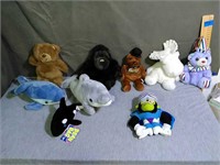Assortment of 9 Plush toys. Some with beans