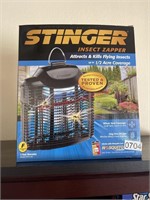 Stinger Insect zapper looks new   (living room)