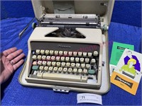 1960's Olympia SM7 portable typewriter in case
