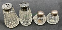 Antique salt and pepper shakers. Covers are