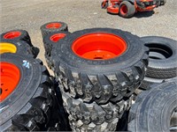 (4) 12-16.5 Skid Steer Tires On Orange Wheels