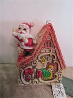 Vintage Soft Plastic Santa on House