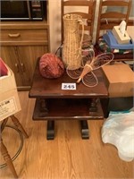 Wooden stand with wicker decorations
