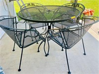 Wrought Iron Black outdoor met table with 4 chairs