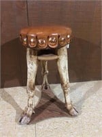 Hand carved leather upholstered bar stool