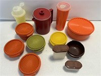 Large lot of Tupperware with lids and pitchers