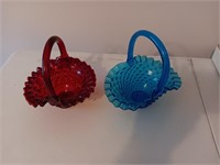 2 Fenton baskets, 1 red 1 blue.