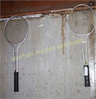 Tennis rackets, car clothes bar, broom, dust pan,