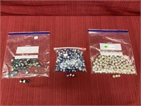 3 bags of marbles: 56 small teal multicolor, 144