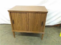 Vintage side table with sliding doors