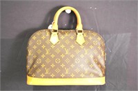 Louis Vuitton Brown Alma Handbag