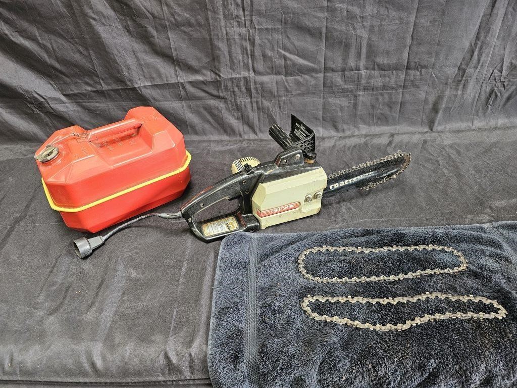 Craftsman electric chain saw with extra chains,