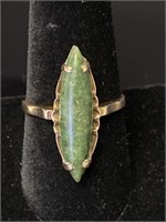 10K gold ring with green stone.