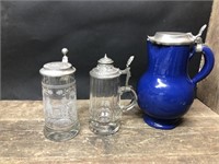 2 glass lidded steins and blue stein as is