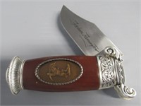 Franklin Mint cowboy knife. Measures: 4" Long.