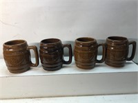 Vintage lot of four pottery barrel mugs