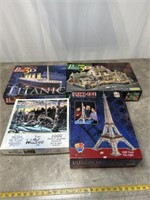 Assortment of 3D puzzles and wolf puzzle