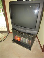 tv, vhs player & tapes & stand