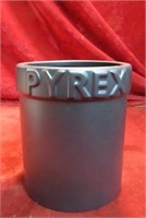 Pyrex utensil container.
