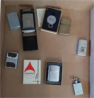 flat of Zippo lighters