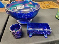 Carnival glass bowl, cradle, and cup