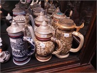 Nine Avon lidded beer steins