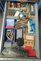 Contents of shop drawer that includes reamers,