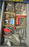 Contents of shop drawer includes end mills,