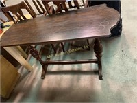 Long console couch table with scalloped ends,