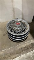 Set of 4 matching wire rimmed hubcaps