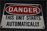 Metal DANGER Unit Starts Automatically Sign